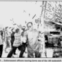 nst-20000216-limaumanis-officers-tearingdown.png