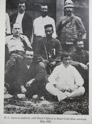 H.C. Syers in uniform with Hugh Clifford at Raub Gold Mine stockade, May 1892.